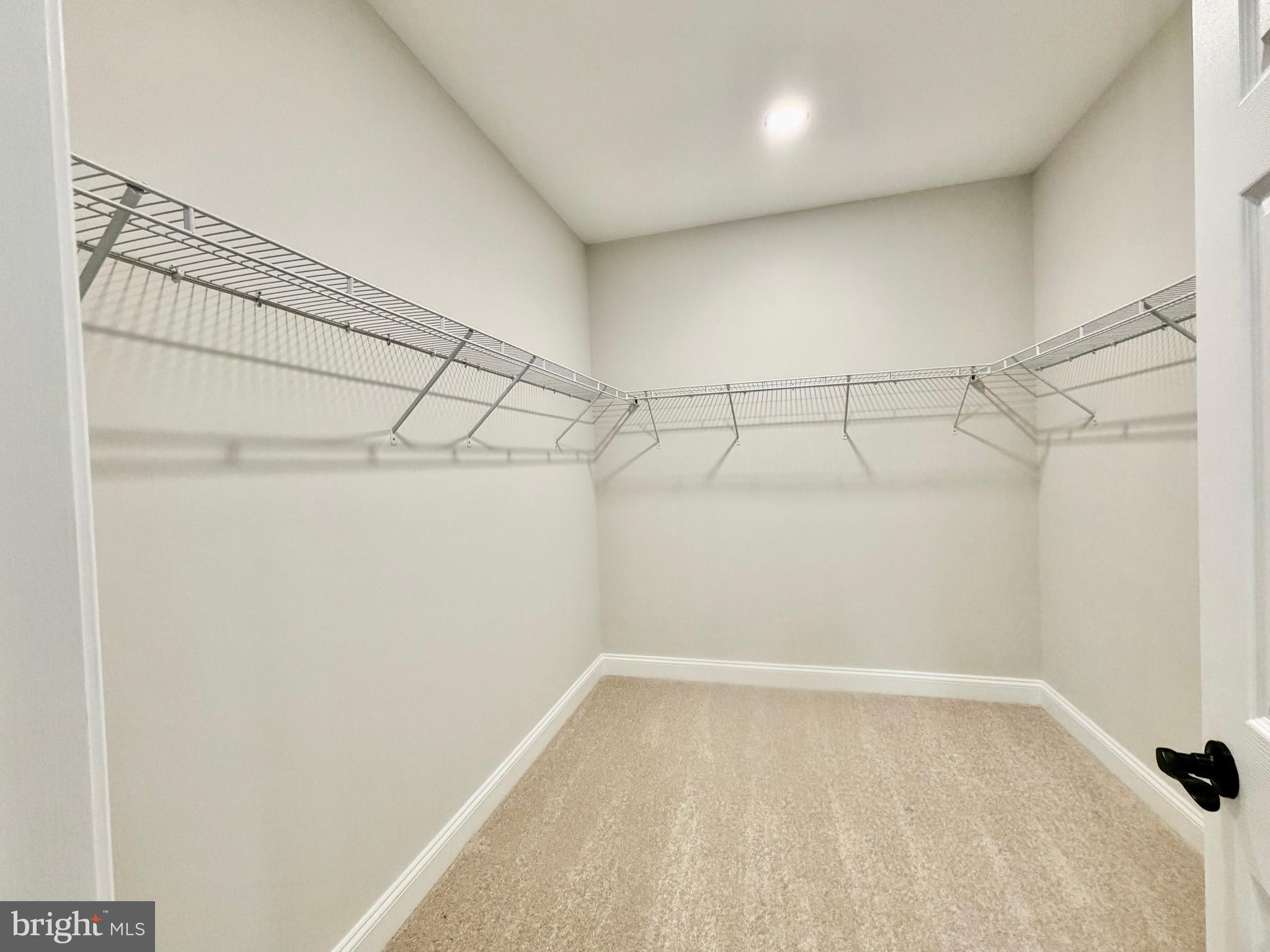 44968 Hewitt Road Callaway, MD 20620 - Photo 16 of 33 a view of a room with racks on the wall