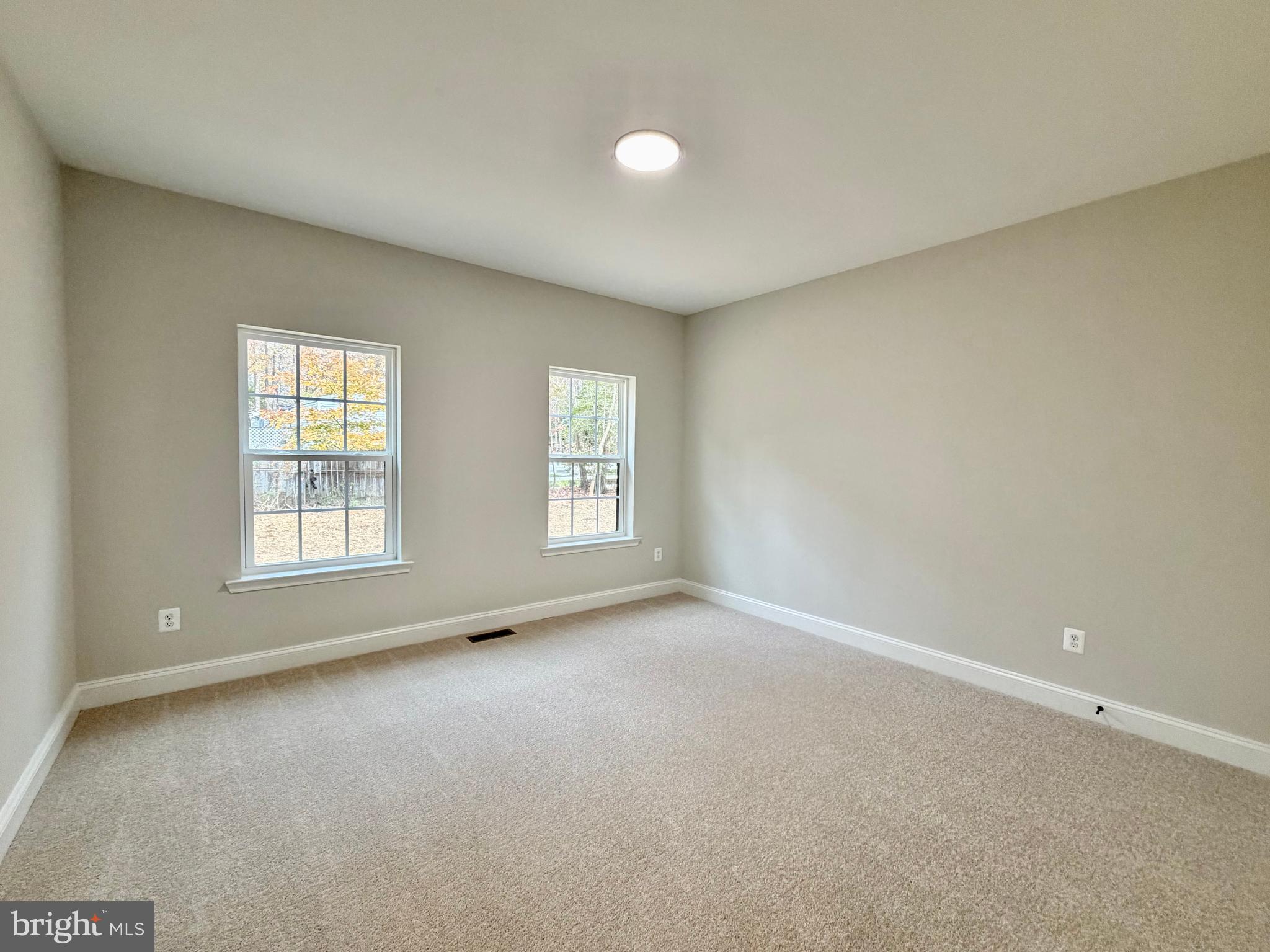 44968 Hewitt Road Callaway, MD 20620 - Photo 21 of 33 an empty room with windows and closet
