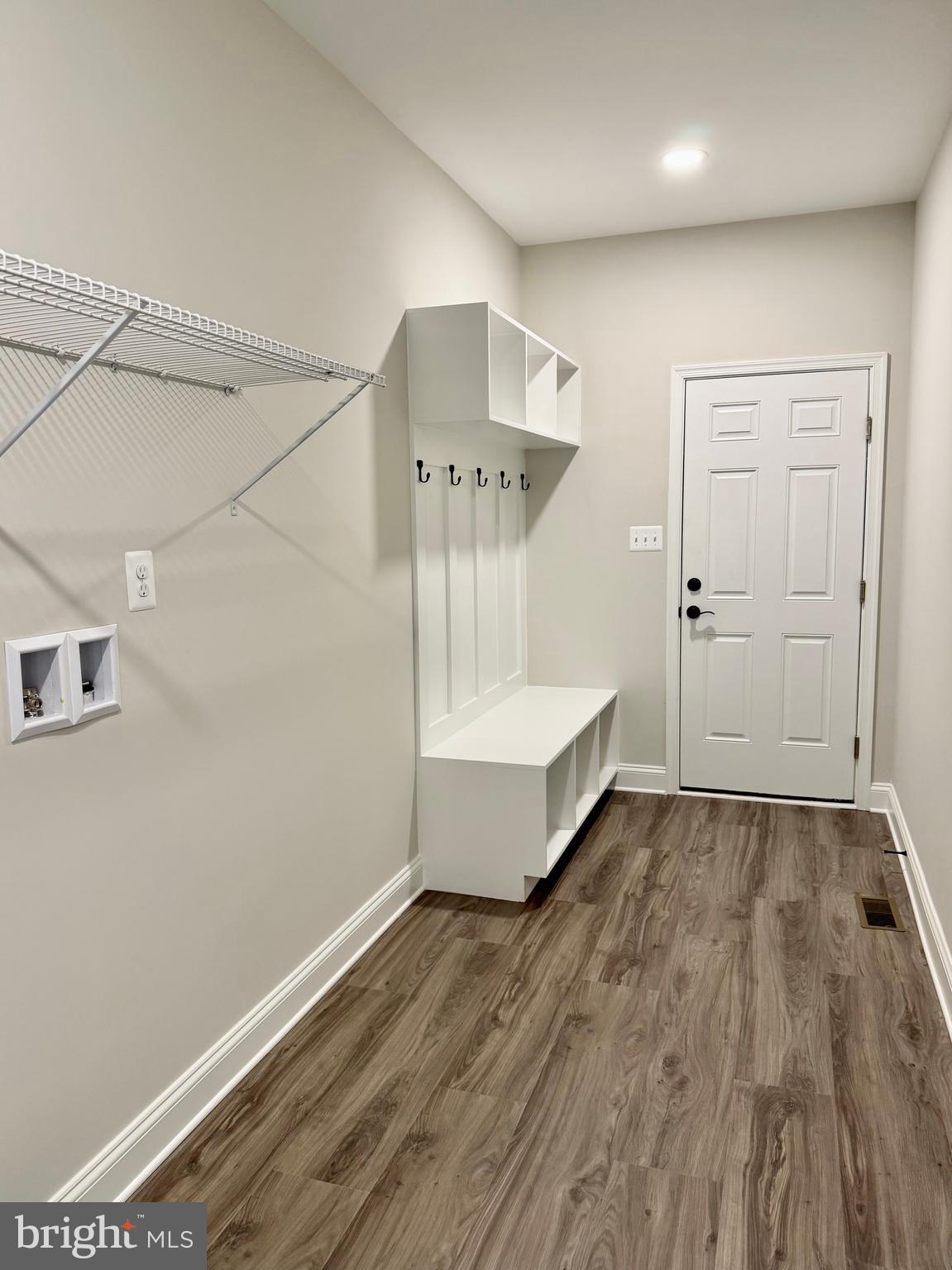 44968 Hewitt Road Callaway, MD 20620 - Photo 26 of 33 an empty room with wooden floor and windows