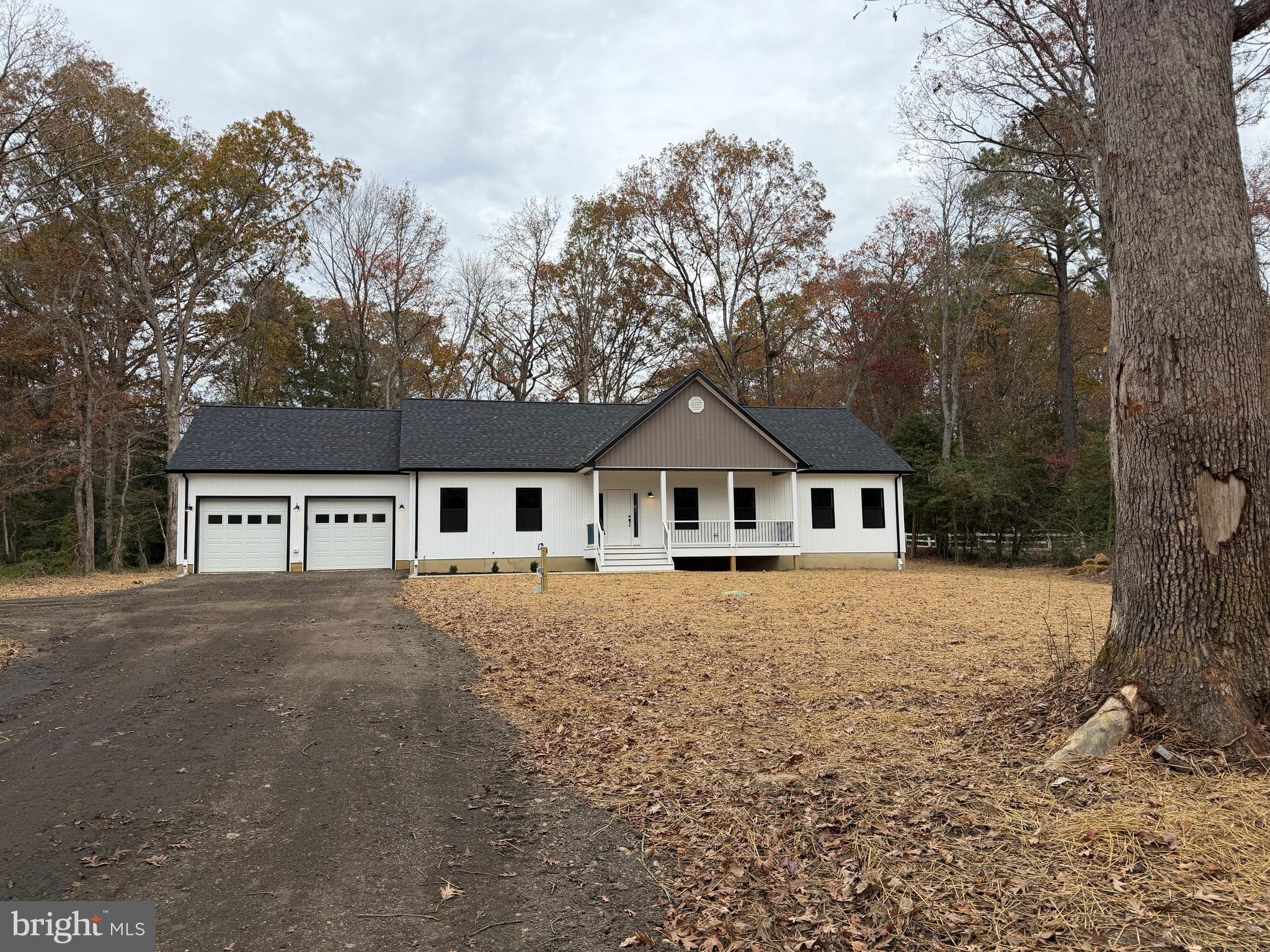 44968 Hewitt Road Callaway, MD 20620 - Photo 31 of 33 front view of a house with a yard