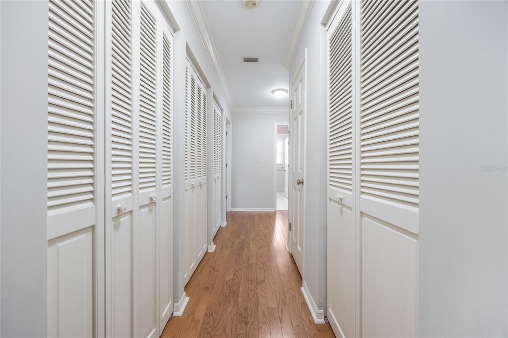 5808 Southwest 35th Way Gainesville, FL 32608 - Photo 21 of 54 a view of a hallway with wooden floor