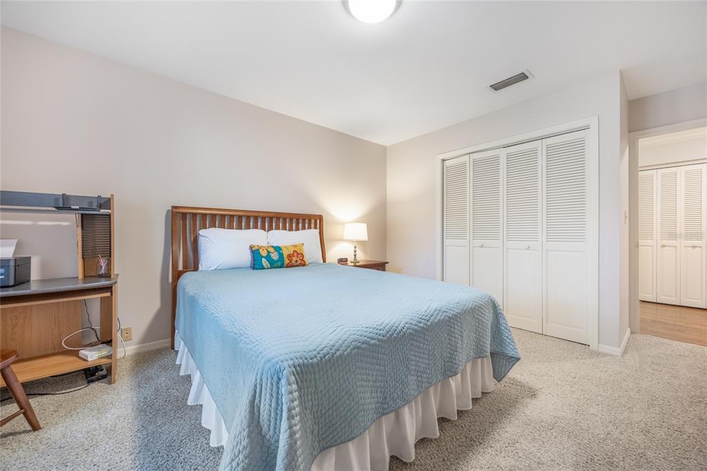 5808 Southwest 35th Way Gainesville, FL 32608 - Photo 31 of 54 a bedroom with a bed and with furniture