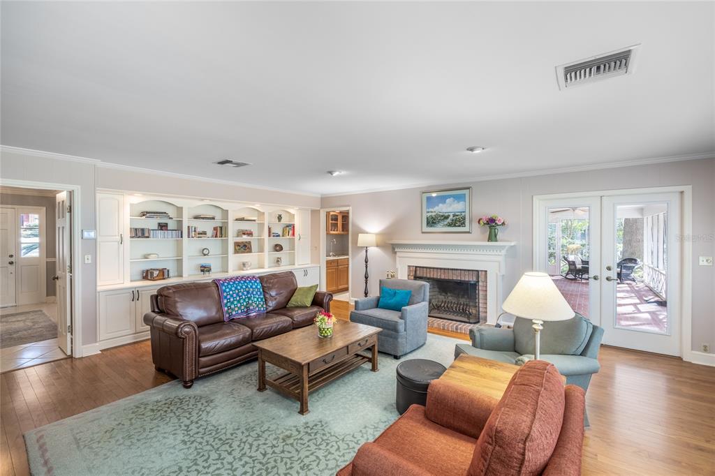 5808 Southwest 35th Way Gainesville, FL 32608 - Photo 4 of 54 a living room with furniture and a fireplace