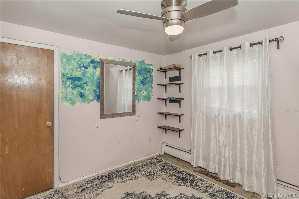 86 Oceanview Avenue Valley Stream, NY 11581 - Photo 19 of 21 a view of entryway with wooden floor