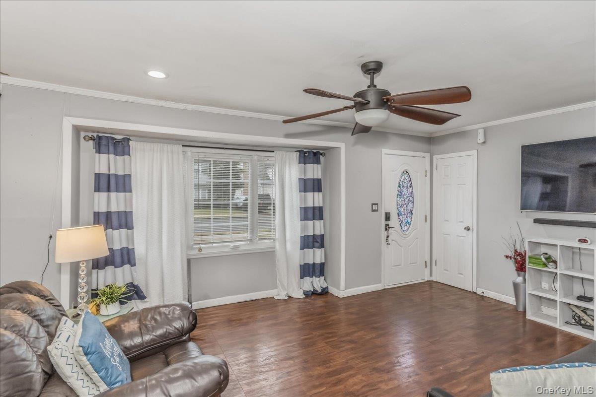 86 Oceanview Avenue Valley Stream, NY 11581 - Photo 5 of 21 a living room with furniture and a window