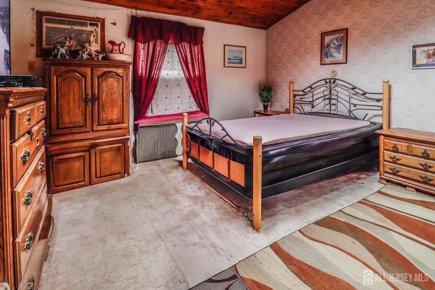 484 Old Post Road Edison, NJ 08817 - Photo 12 of 19 a bedroom with a bed and wooden floor