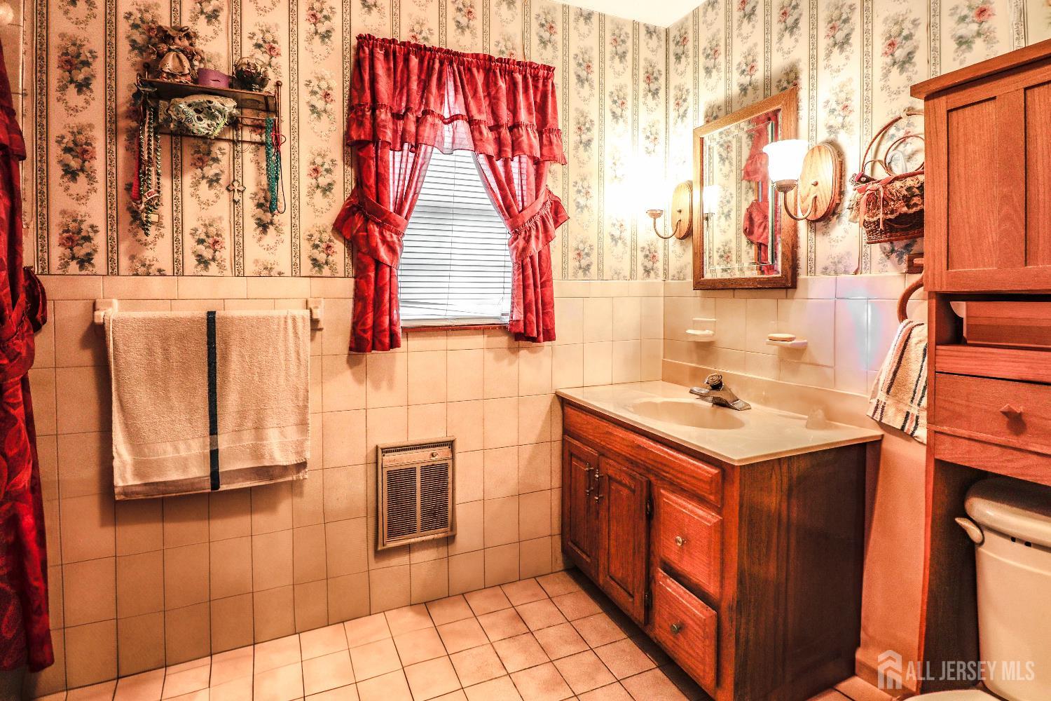 484 Old Post Road Edison, NJ 08817 - Photo 13 of 19 a utility room with a sink and cabinets