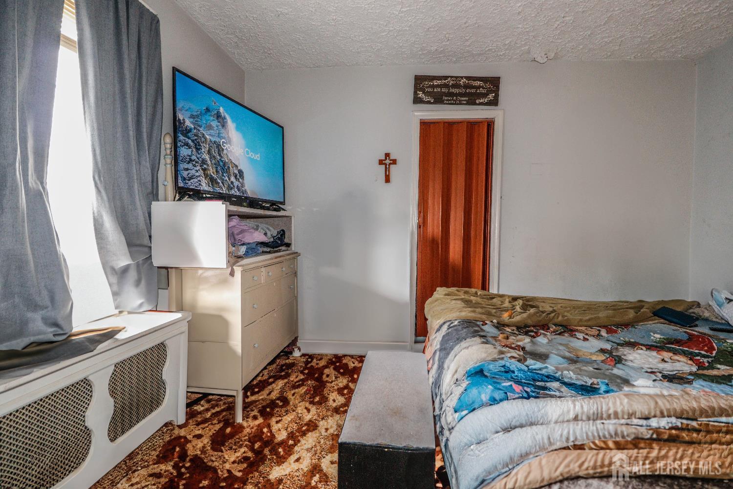 484 Old Post Road Edison, NJ 08817 - Photo 15 of 19 a bedroom with a bed and a window