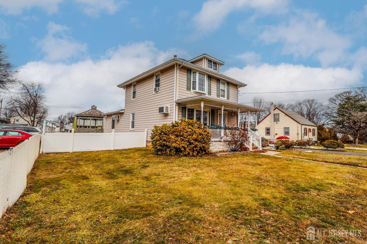 484 Old Post Road Edison, NJ 08817 - Photo 2 of 19 a view of a house with a big yard and large trees