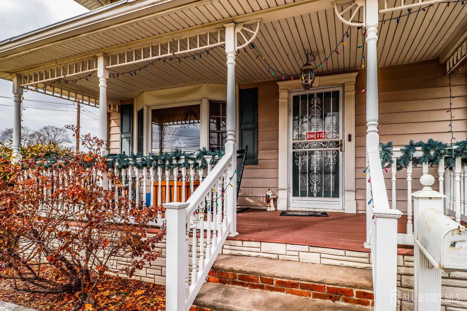 484 Old Post Road Edison, NJ 08817 - Photo 4 of 19 a view of a brick house with large windows