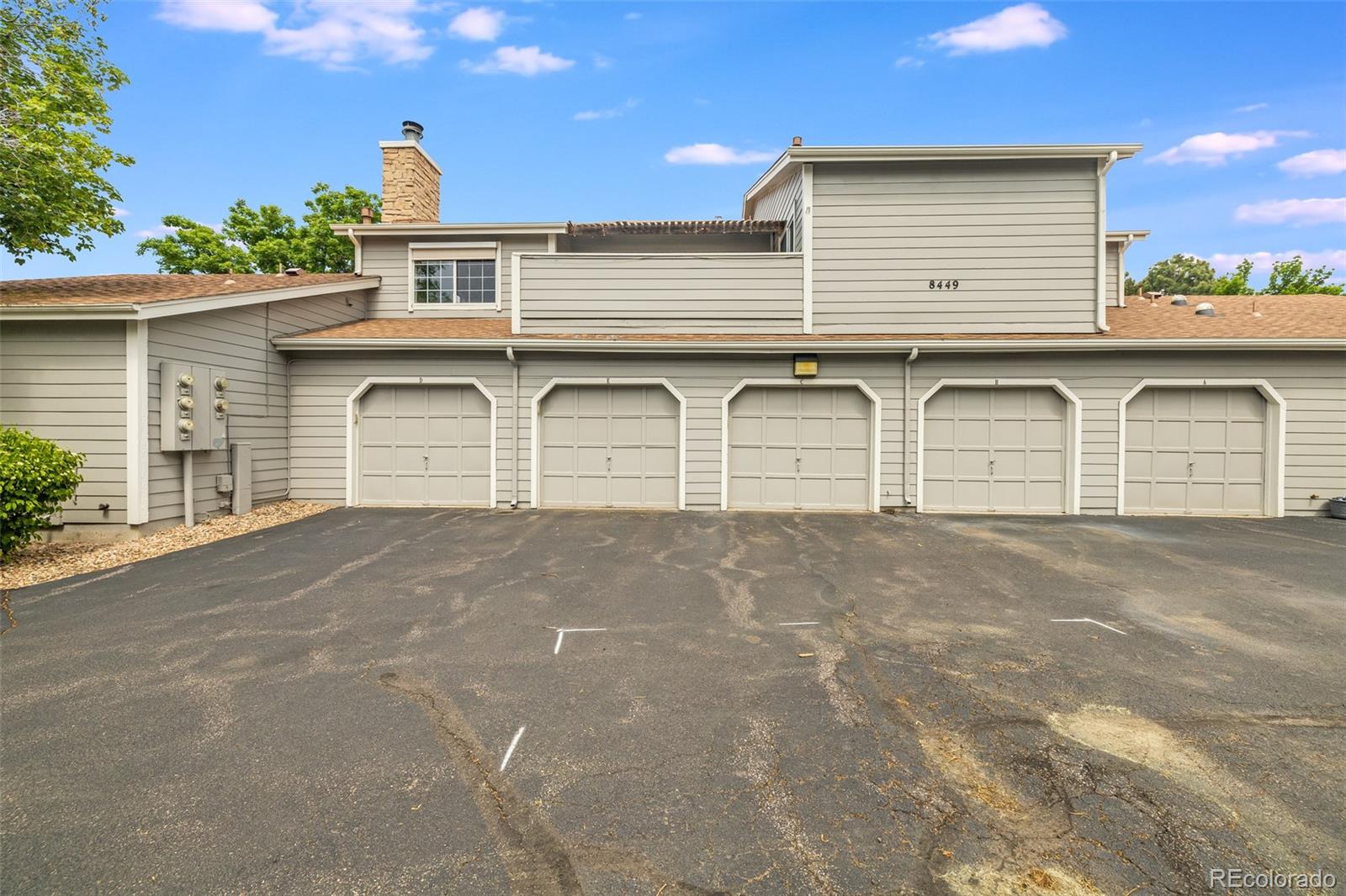 8449 Everett Way, Unit E Arvada, CO 80005 - Photo 25 of 25 a house view with a outdoor space