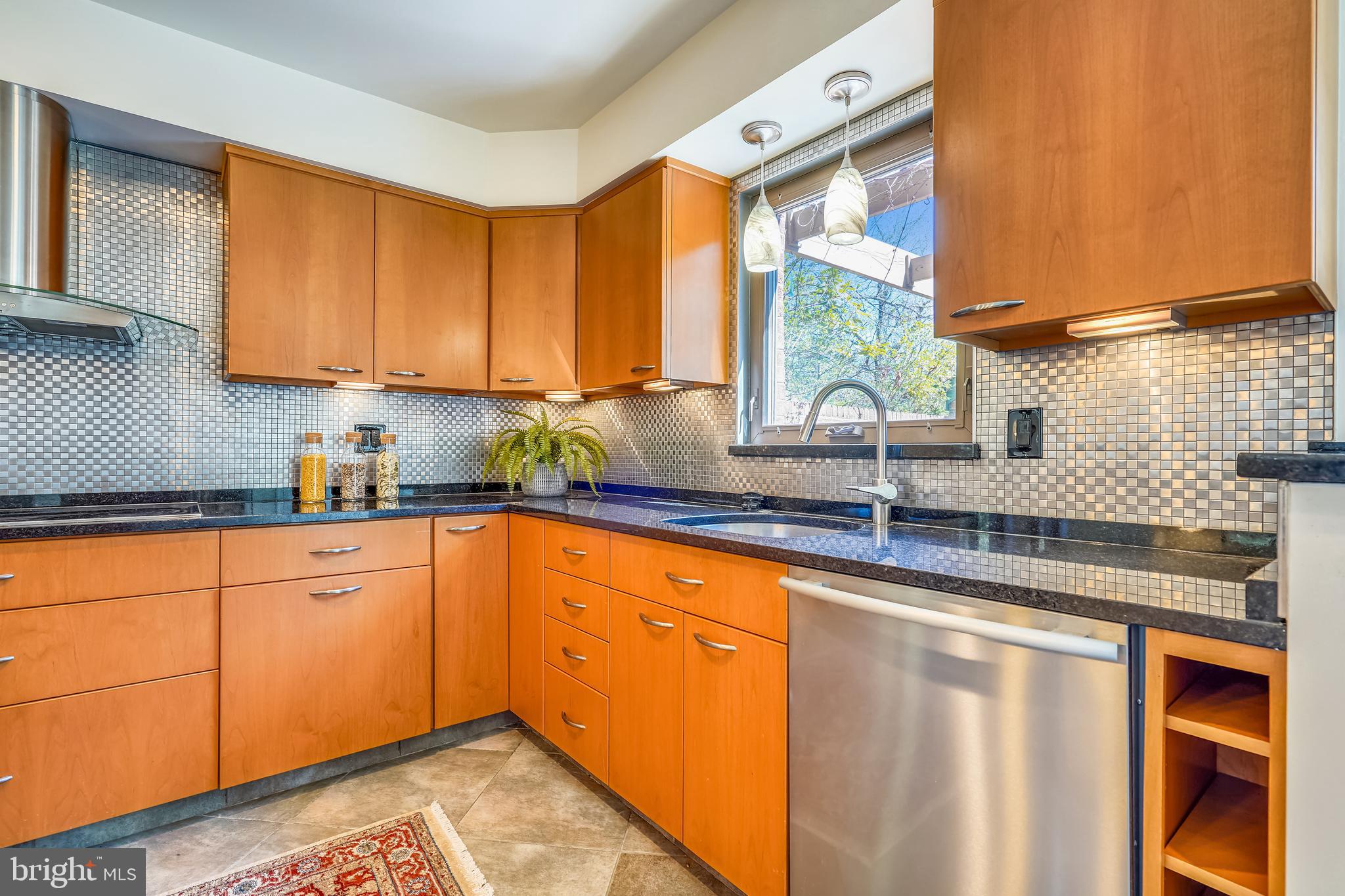 11310 Harborside Cluster Reston, VA 20191 - Photo 7 of 31 Black granite countertops