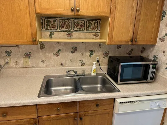 $155,000 | 700 East Airport Boulevard, Unit B7, Sanford, FL 32773