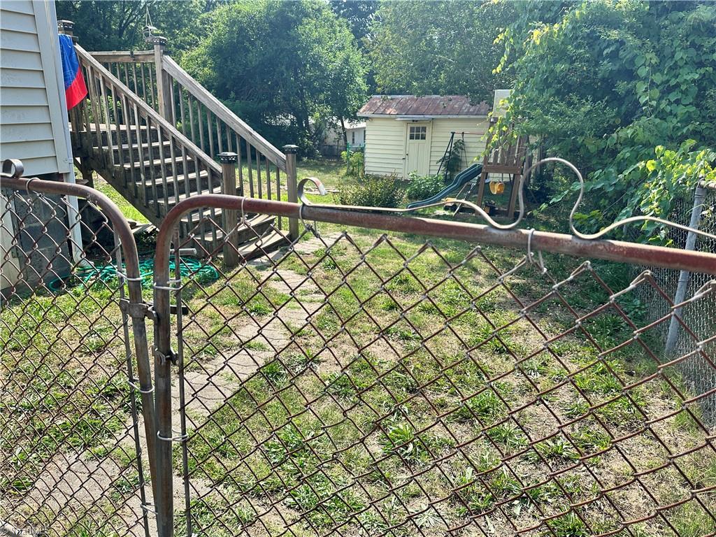 412 Griffith Street Thomasville, NC 27360 - Photo 6 of 14 Fenced backyard & it’s large.