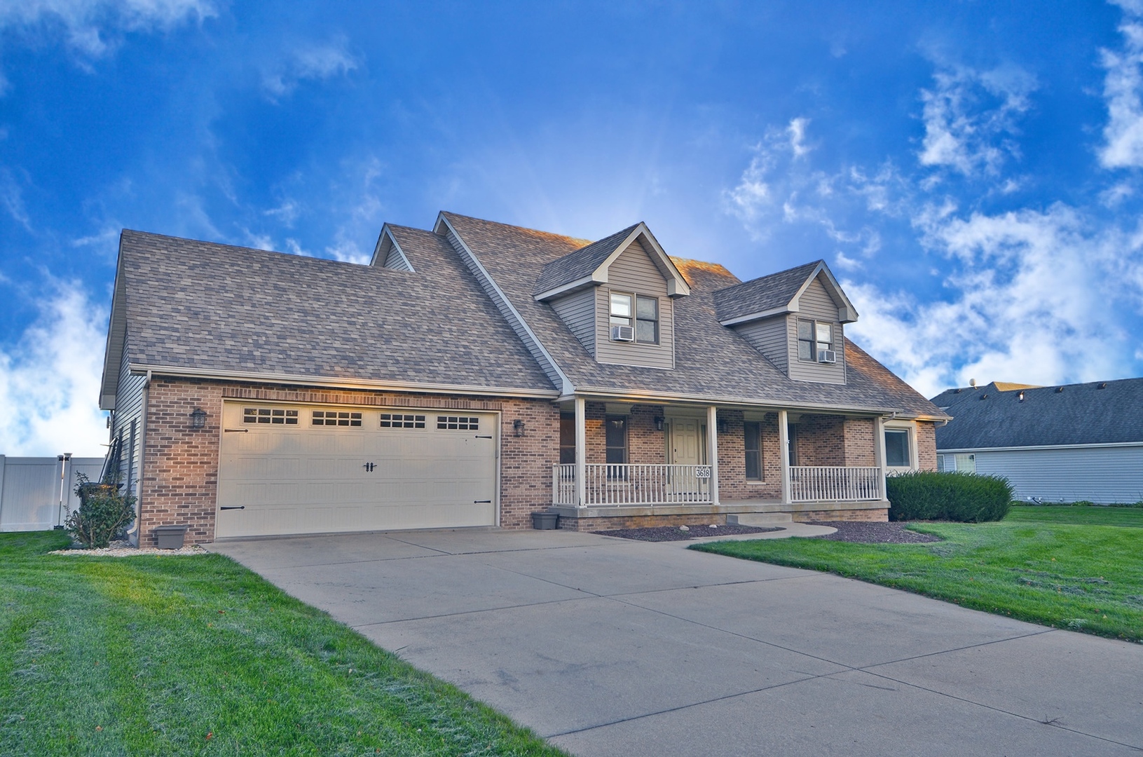 3618 East 1769th Road Ottawa, IL 61350 - Photo 1 of 36 a front view of a house with a yard and garage