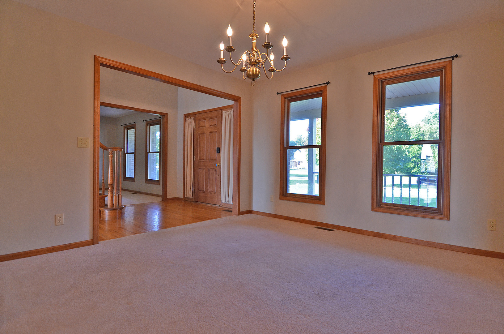3618 East 1769th Road Ottawa, IL 61350 - Photo 17 of 36 a view of an empty room with chandelier and wooden floor