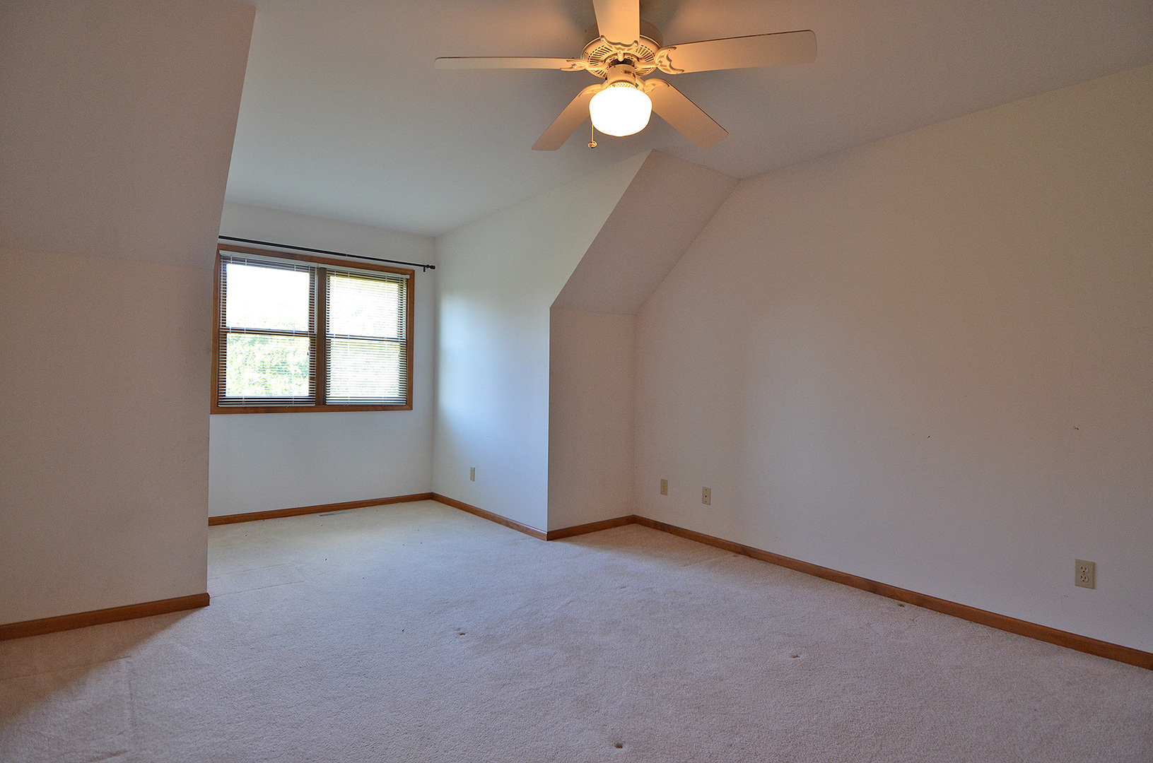 3618 East 1769th Road Ottawa, IL 61350 - Photo 28 of 36 an empty room with windows and fan