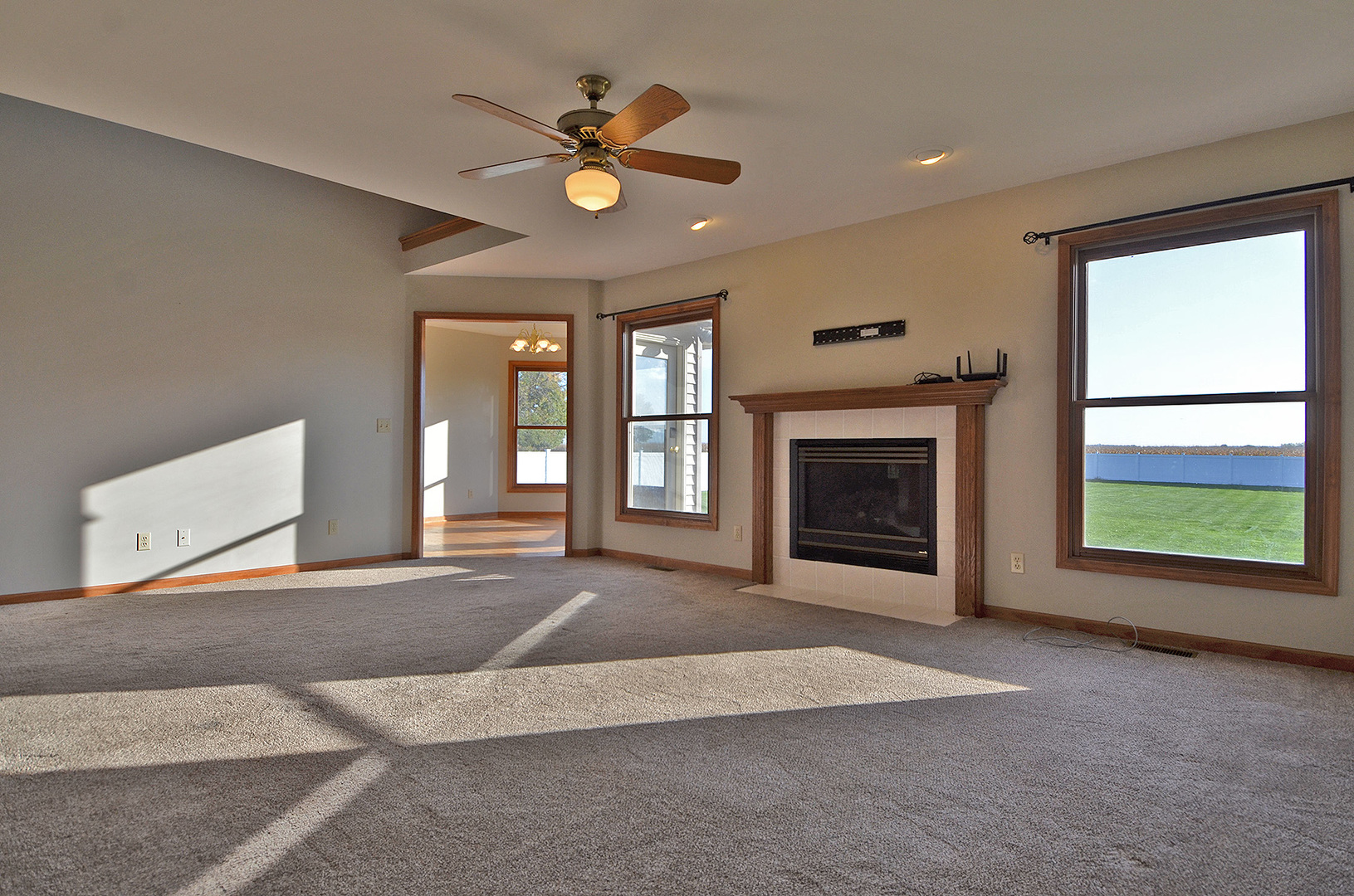 3618 East 1769th Road Ottawa, IL 61350 - Photo 6 of 36 a view of an empty room with window and fireplace
