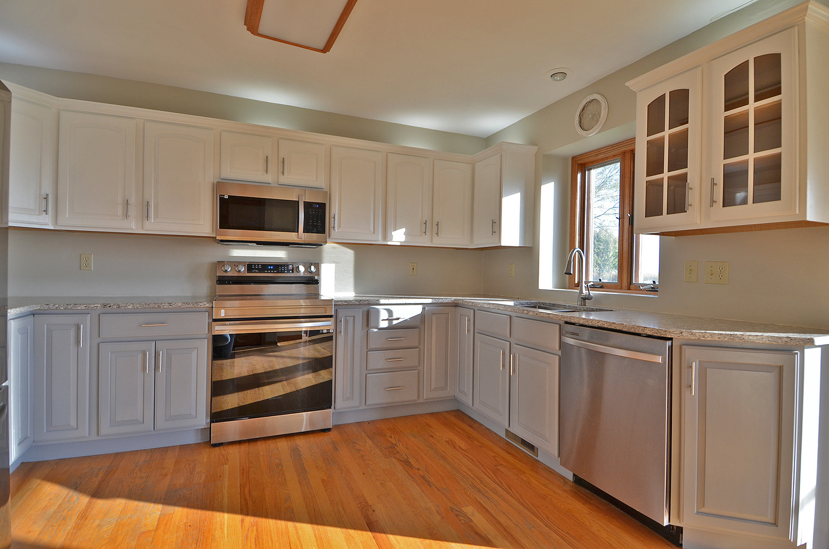 3618 East 1769th Road Ottawa, IL 61350 - Photo 7 of 36 a kitchen with stainless steel appliances a stove sink and microwave