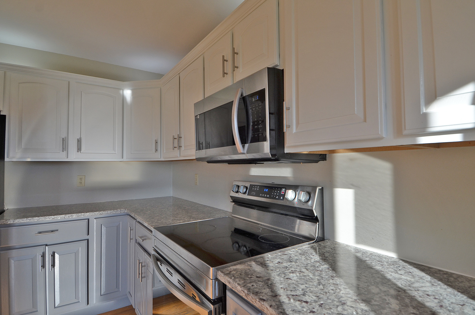 3618 East 1769th Road Ottawa, IL 61350 - Photo 9 of 36 a kitchen with stainless steel appliances granite countertop a stove a sink and a microwave