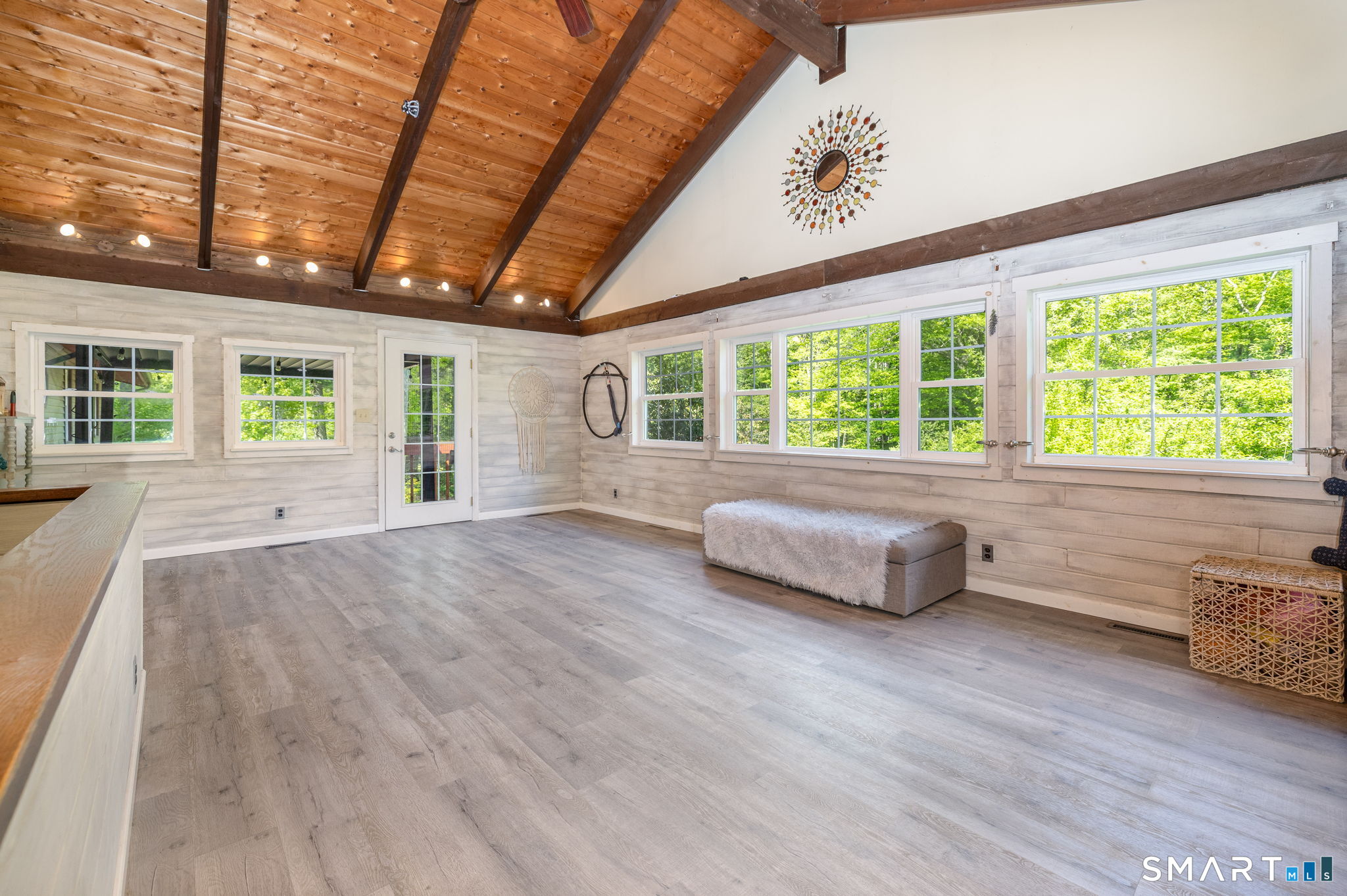 250 Center Hill Road Barkhamsted, CT 06063 - Photo 5 of 40 a living room with furniture and a large window