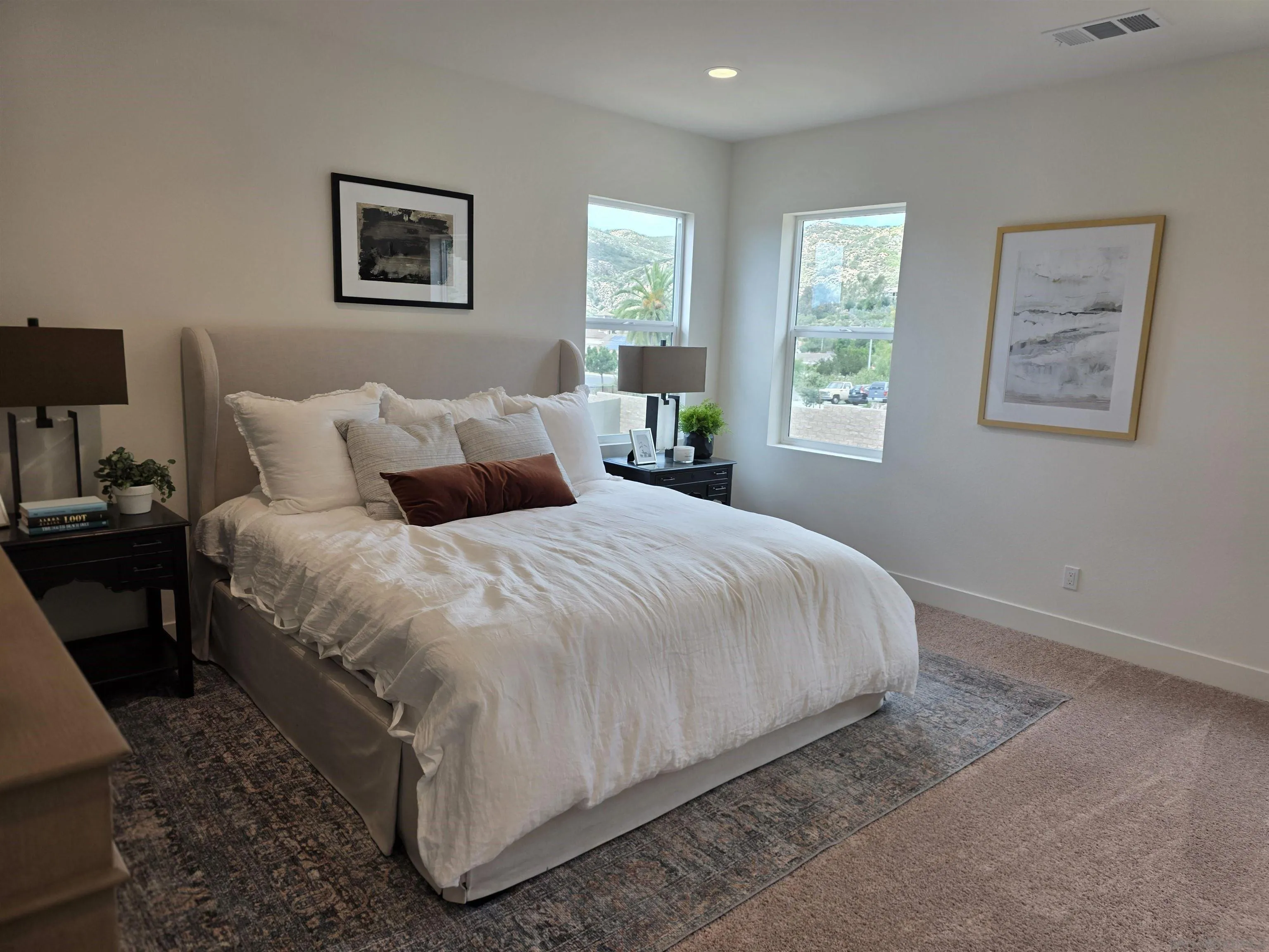 3140 Smith Place Escondido, CA 92027 - Photo 16 of 19 a large bed sitting in a bedroom next to a window