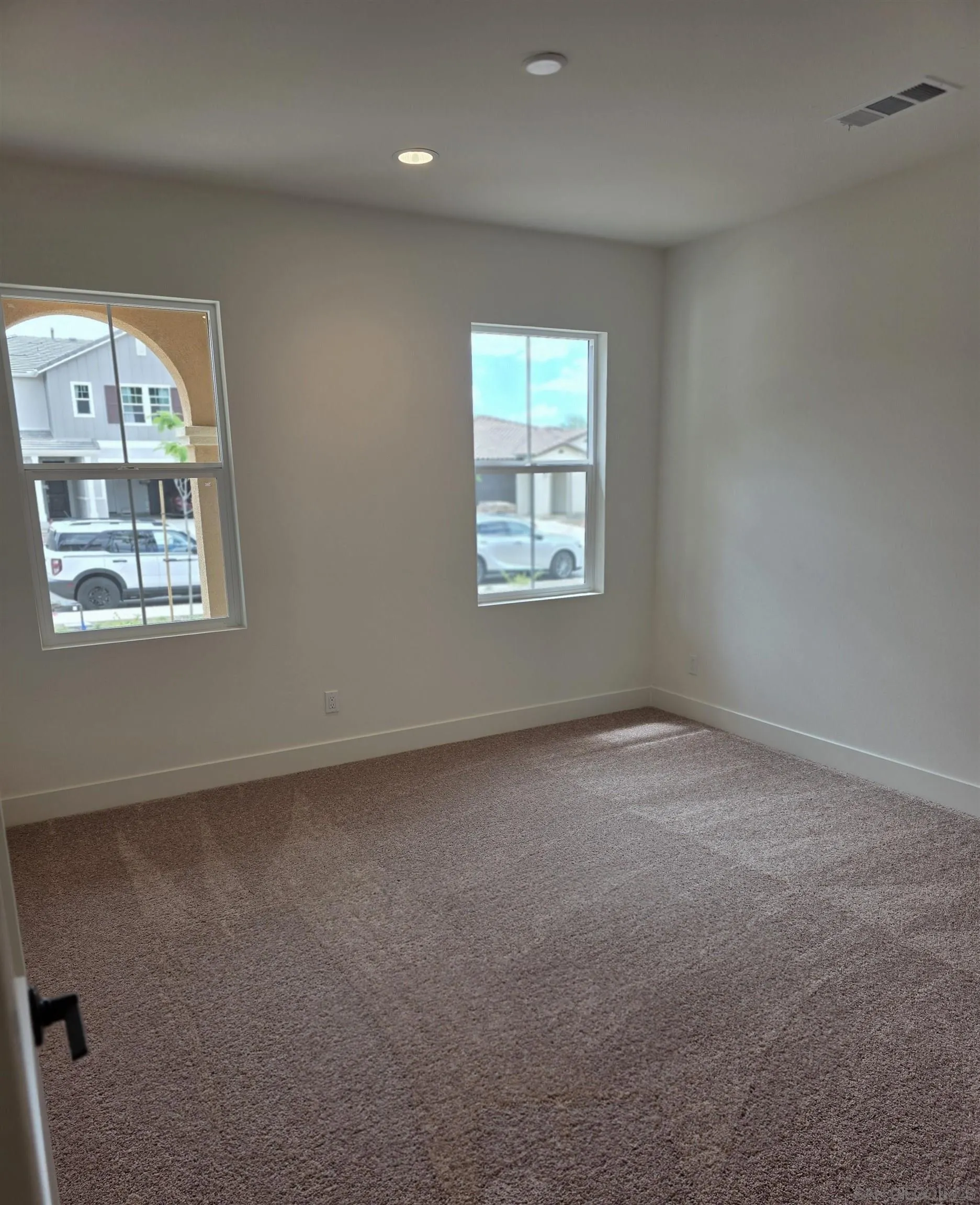 3140 Smith Place Escondido, CA 92027 - Photo 3 of 19 an empty room with a window
