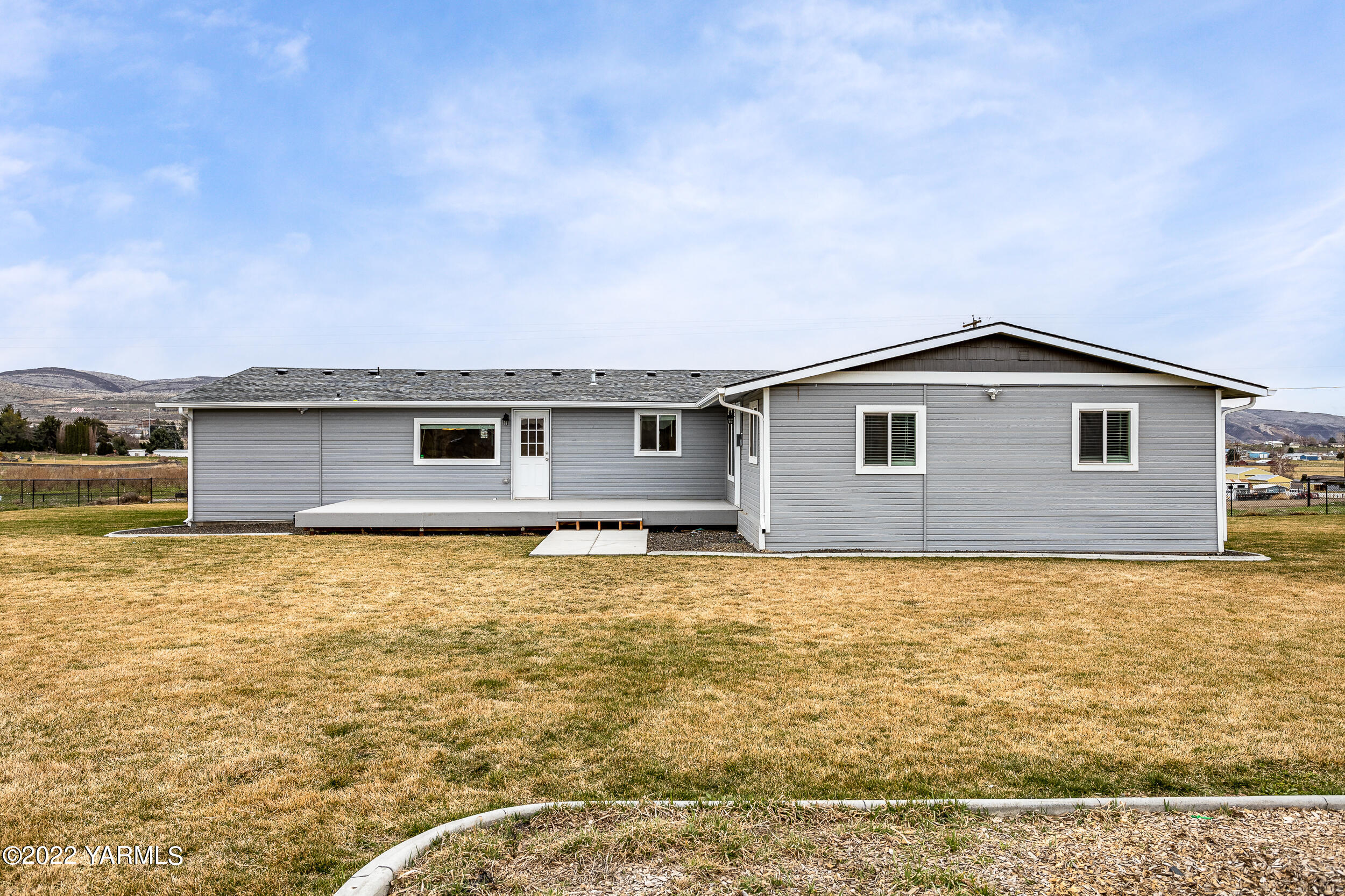 211 Wilson Road Yakima, WA 98901 - Photo 23 of 35 a house view with a garden space