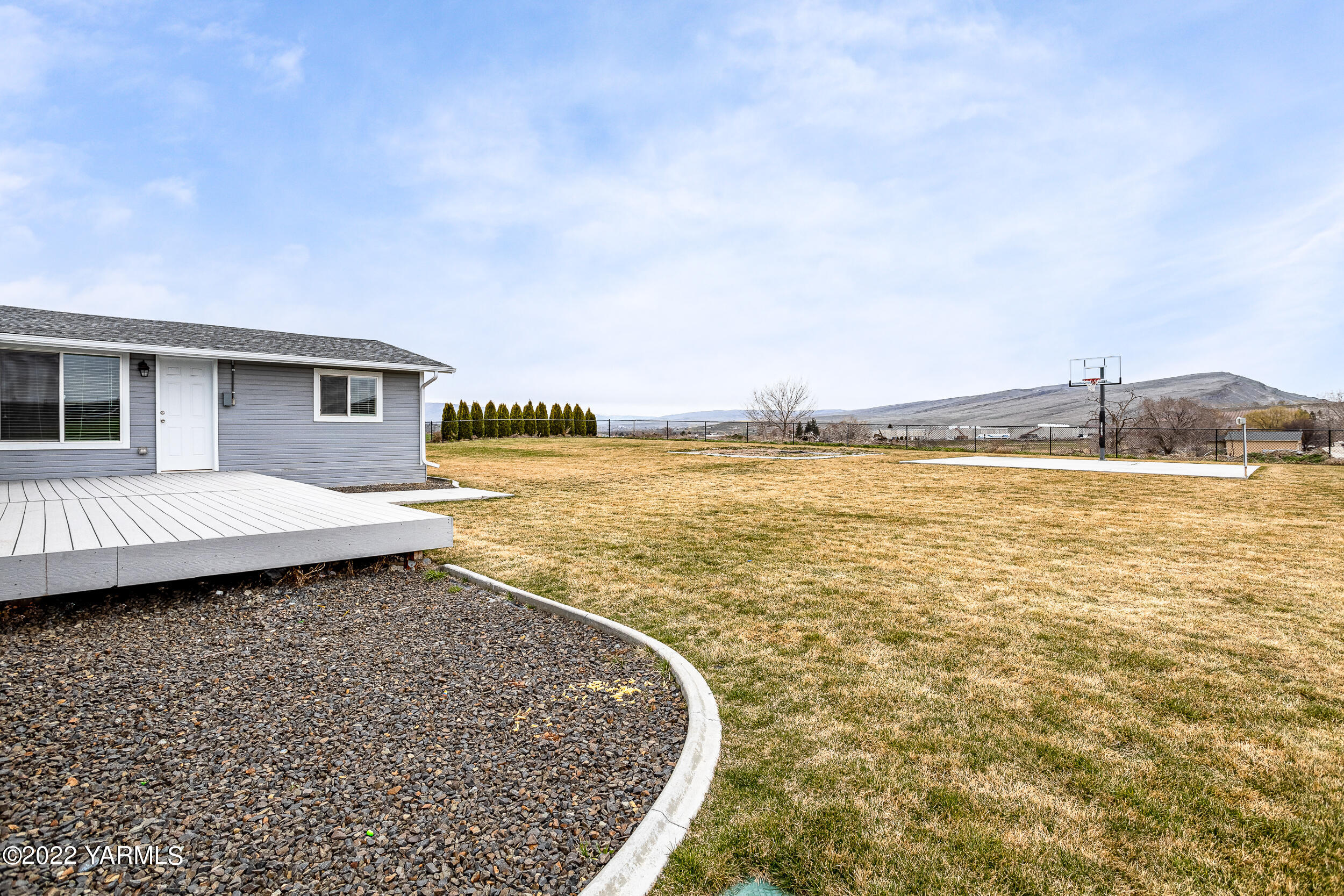 211 Wilson Road Yakima, WA 98901 - Photo 25 of 35 a view of a terrace with wooden floor and lake view