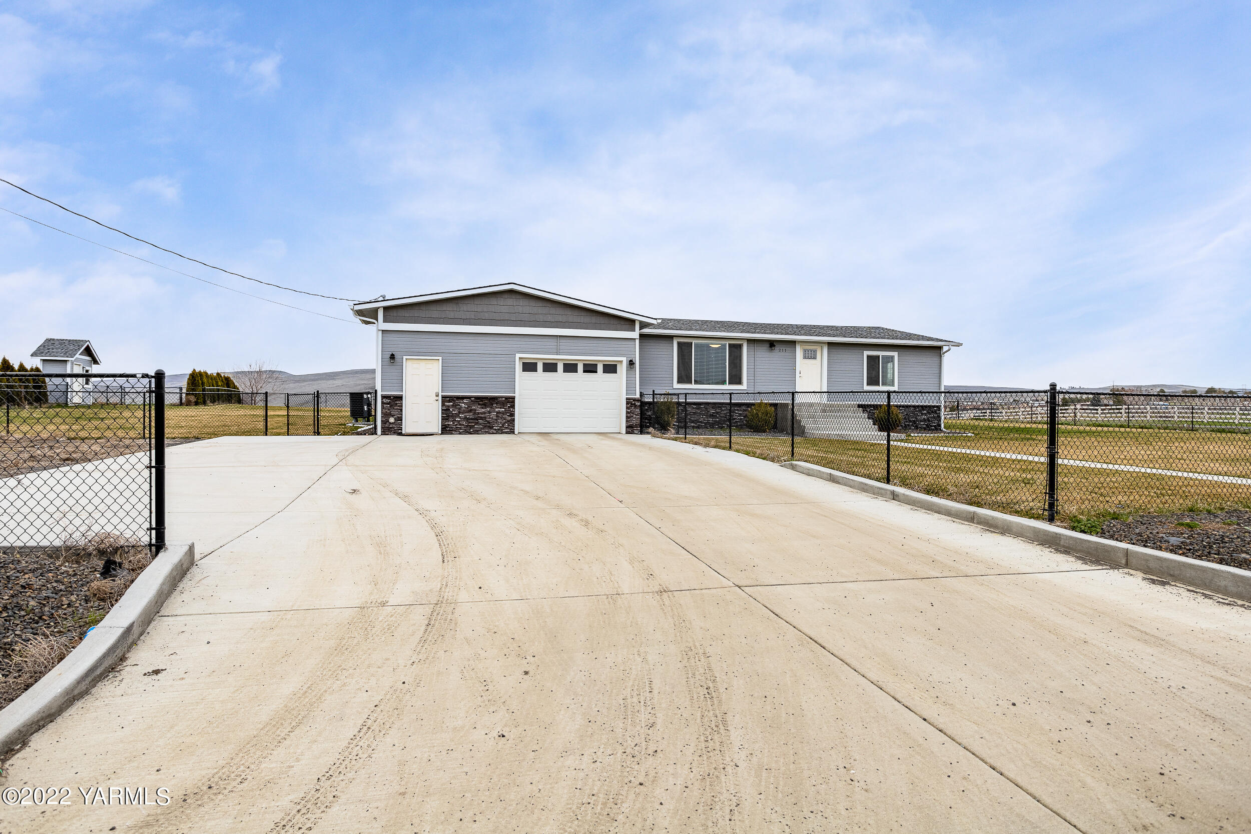 211 Wilson Road Yakima, WA 98901 - Photo 33 of 35 a view of house with outdoor space