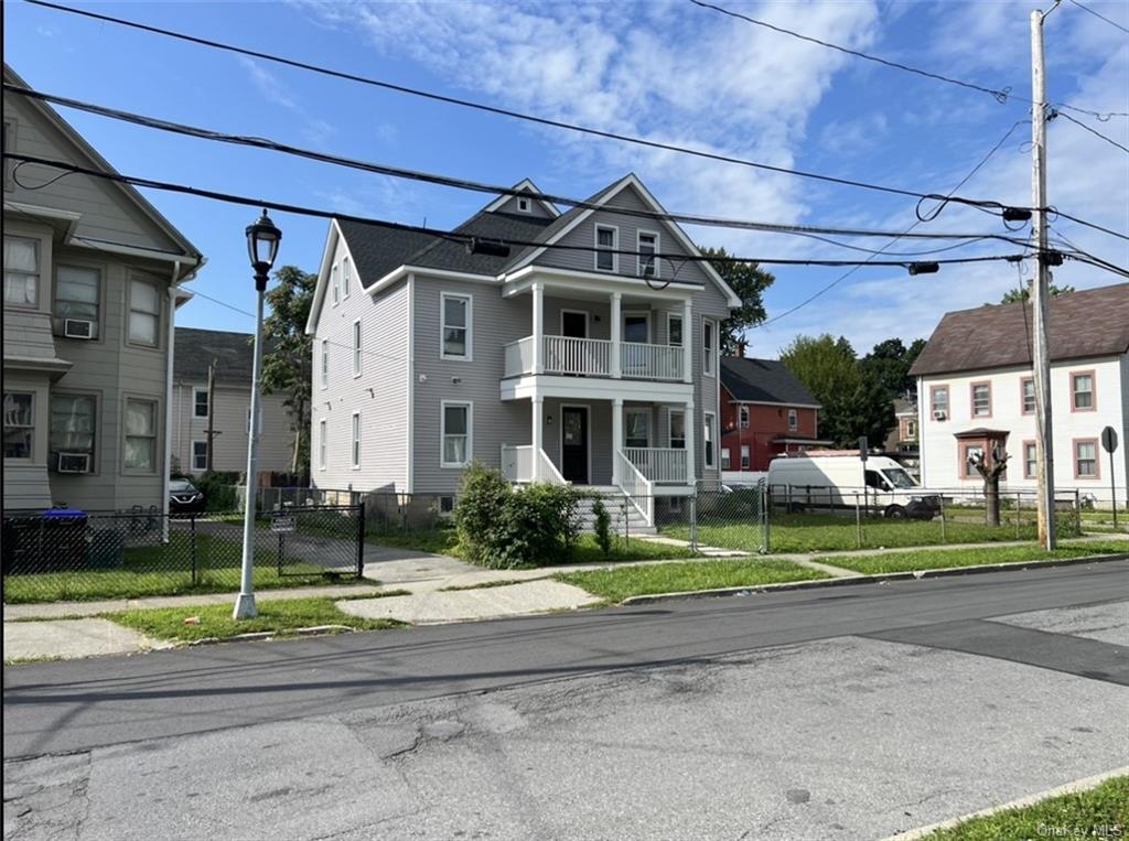 2 Fox Terrace Poughkeepsie, NY 12603 - Photo 3 of 7 a front view of a building with garden