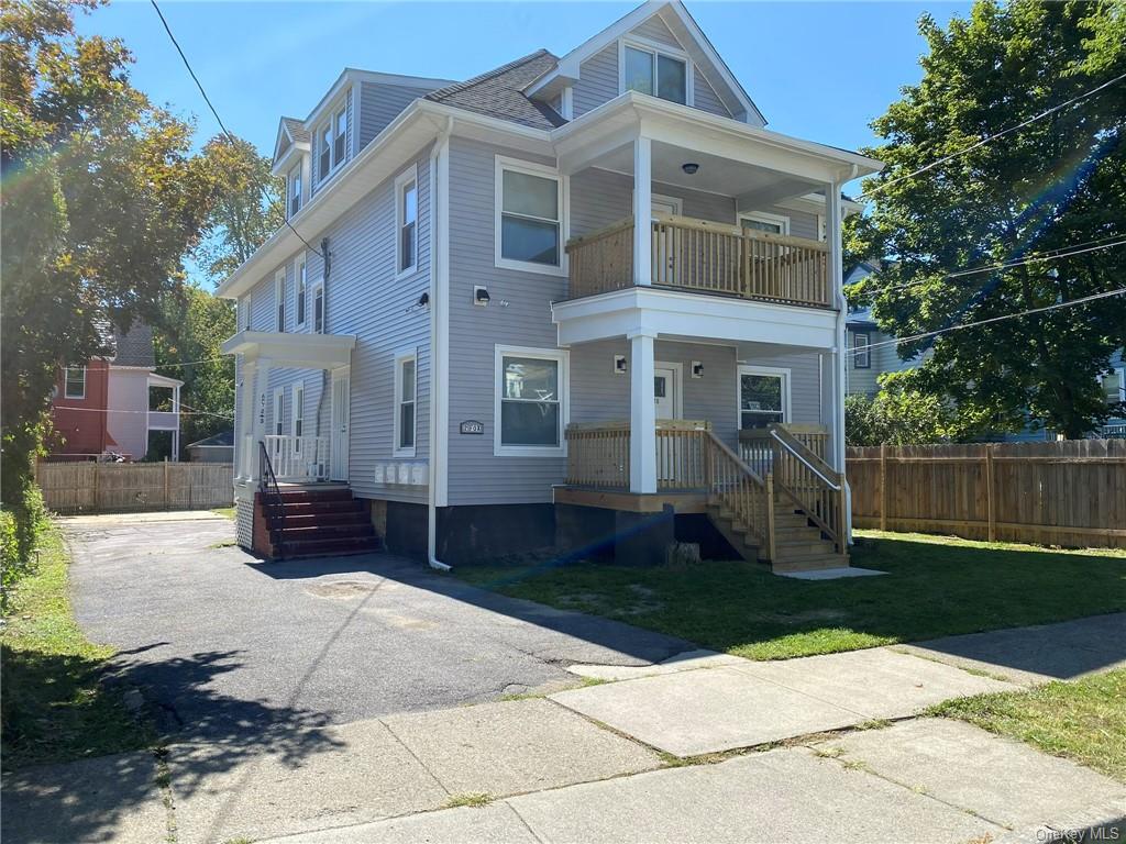 2 Fox Terrace Poughkeepsie, NY 12603 - Photo 6 of 7 a front view of a house with garden