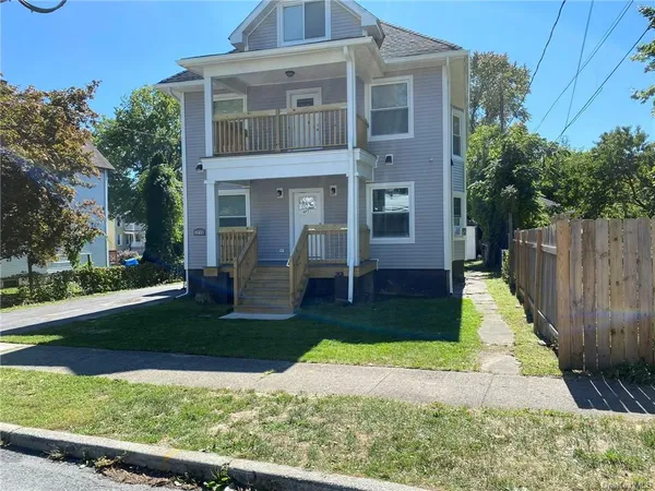 a house view with a garden space