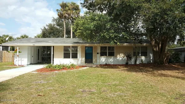 front view of a house with a patio