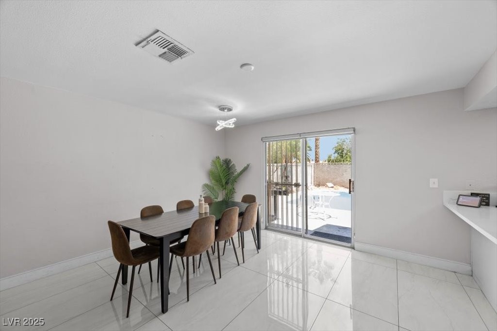 3618 Redwood Street Las Vegas, NV 89103 - Photo 11 of 57 Eating area/dining area has easy access to your private backyard oasis!