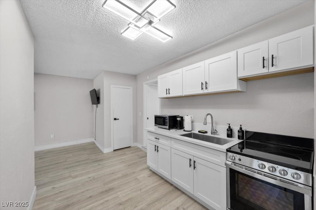 3618 Redwood Street Las Vegas, NV 89103 - Photo 17 of 57 Casita kitchen provides a delightful blend of charm and utility—ideal for relaxed living.