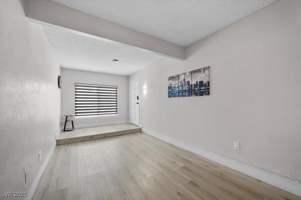3618 Redwood Street Las Vegas, NV 89103 - Photo 19 of 57 Refined simplicity meets everyday comfort in this casita living room.