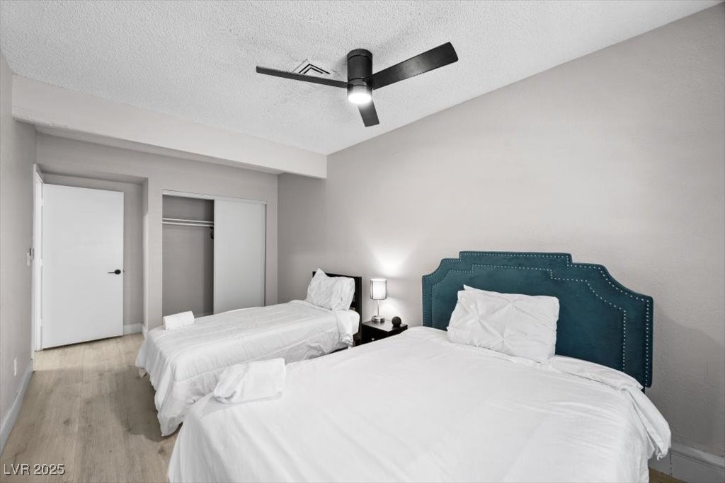 3618 Redwood Street Las Vegas, NV 89103 - Photo 28 of 57 Third bedroom offers seamless access to game room amenities, including a stylish kitchenette.