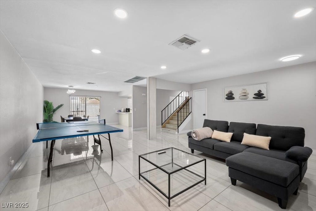 3618 Redwood Street Las Vegas, NV 89103 - Photo 3 of 57 Open layout effortlessly connects the living area with dining area!