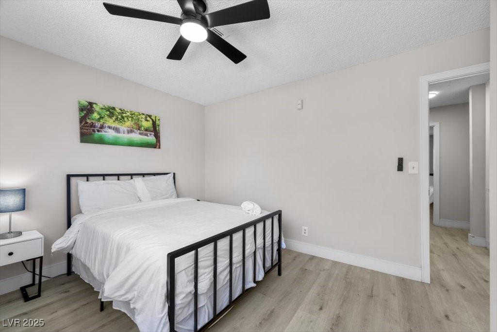 3618 Redwood Street Las Vegas, NV 89103 - Photo 37 of 57 Well-sized 6th bedroom with ceiling fan and a cheerful atmosphere.