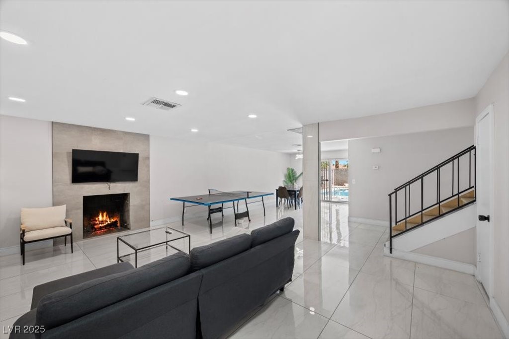 3618 Redwood Street Las Vegas, NV 89103 - Photo 5 of 57 Gas fireplace brings ambiance and character to this open concept living room!