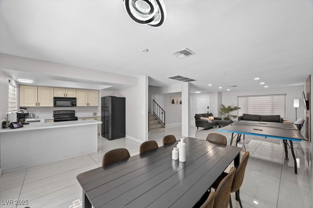 3618 Redwood Street Las Vegas, NV 89103 - Photo 9 of 57 Thoughtfully laid out dining space with direct access to both kitchen and living room.