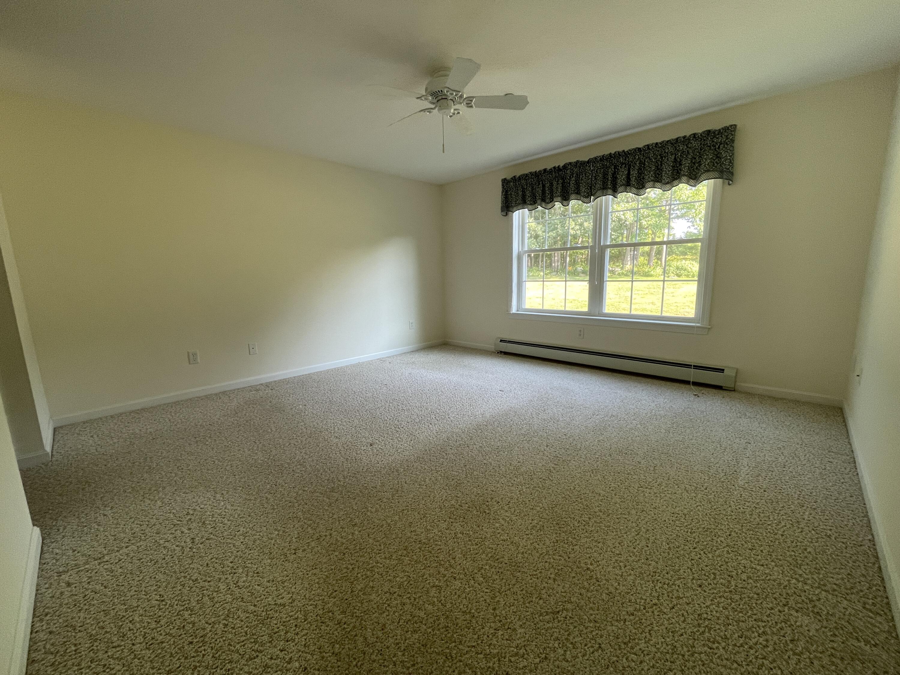 20 Ridgefield Drive, Unit 16 Gorham, ME 04038 - Photo 13 of 27 Primary Bedroom