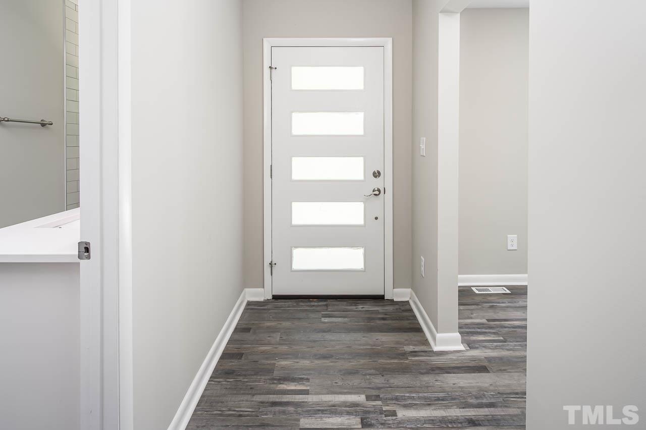 3401 Forest Road Raleigh, NC 27604 - Photo 2 of 30 a view of a room with wooden floor