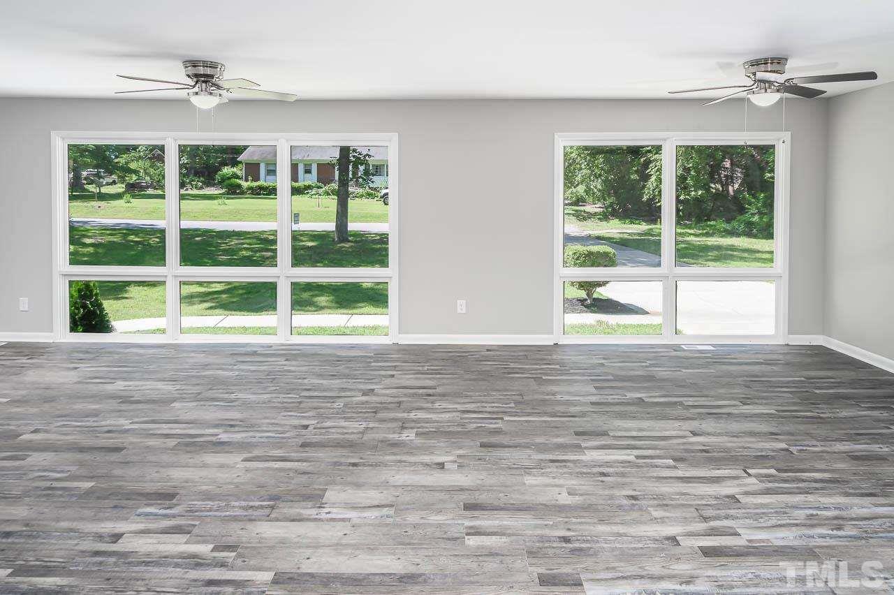 3401 Forest Road Raleigh, NC 27604 - Photo 3 of 30 a view of an empty room with a window