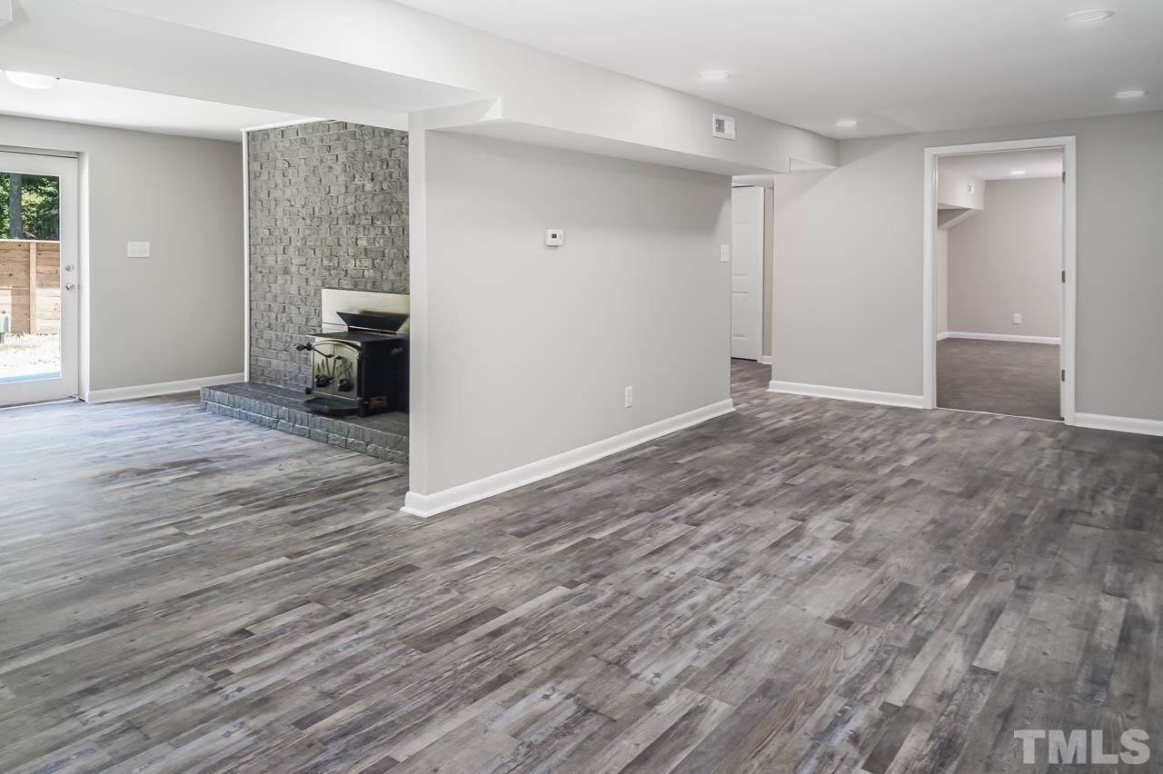 3401 Forest Road Raleigh, NC 27604 - Photo 6 of 30 wooden floor in an empty room