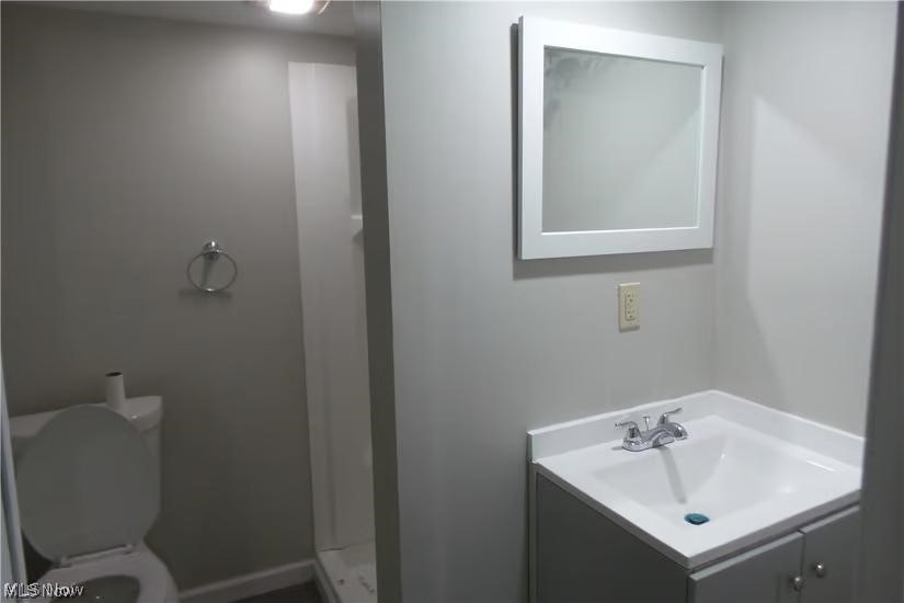 3808 Delmore Road Cleveland, OH 44121 - Photo 3 of 27 Bathroom featuring oversized vanity and toilet
