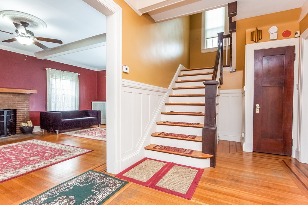8 Riverview Terrace Springfield, MA 01108 - Photo 6 of 24 a view of a hallway with furniture and a rug