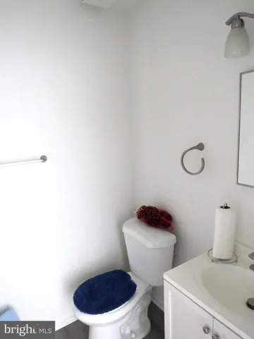 a bathroom with a toilet and a sink