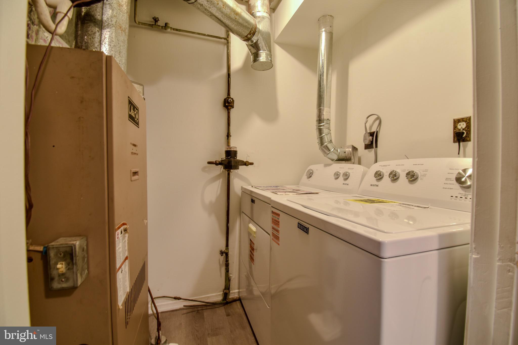 7730 Merrick Lane Landover, MD 20785 - Photo 19 of 19 a bathroom with a sink and mirror